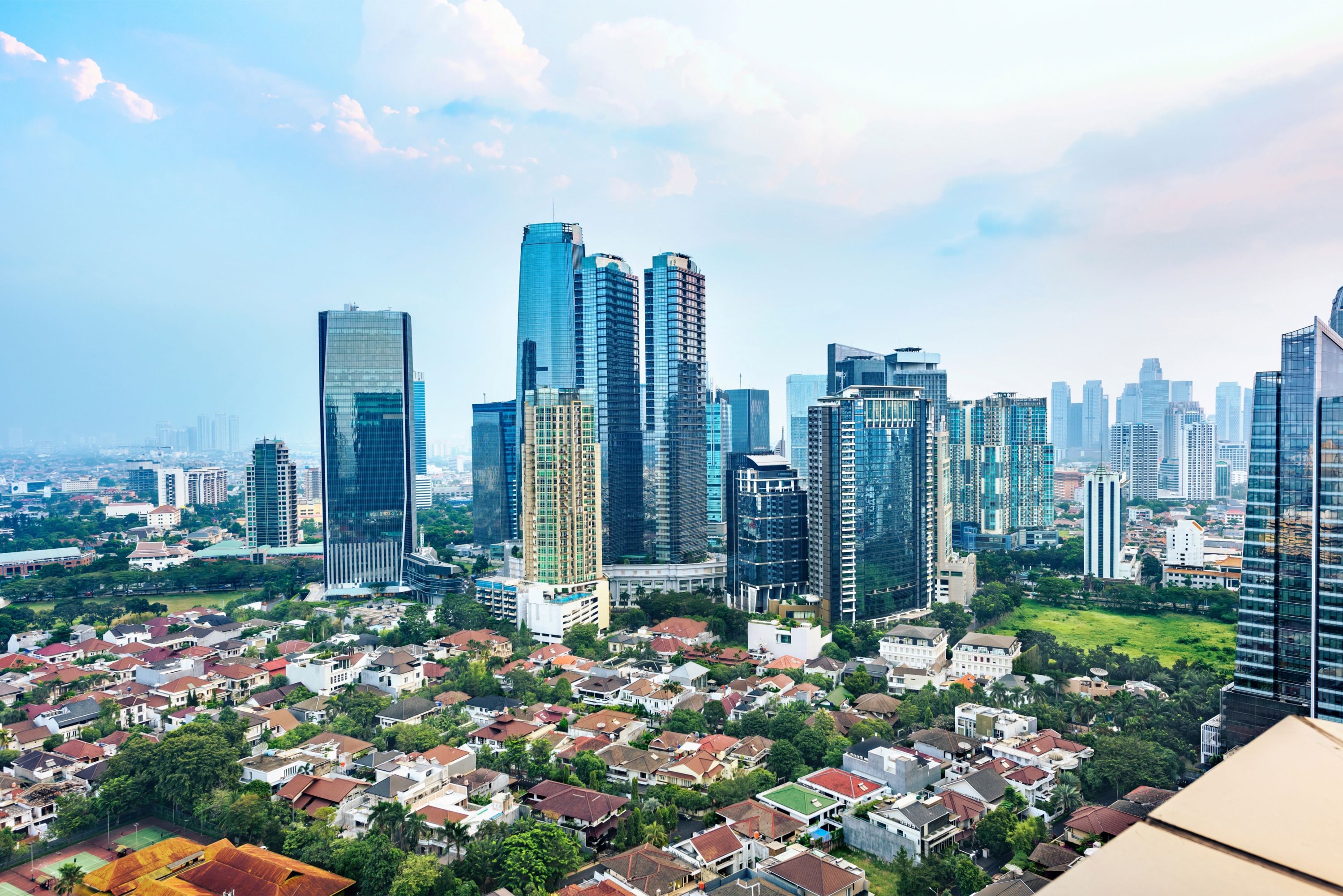 Jakarta,City,Skyline,With,Urban,Skyscrapers,In,The,Afternoon